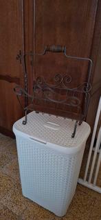 Wasmand/krantenrekje, Ophalen