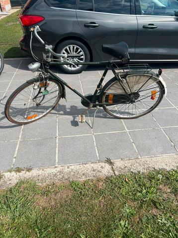 Oude herenfiets beschikbaar voor biedingen