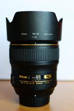 De topper Nikon 35mm 1.4g, Ophalen