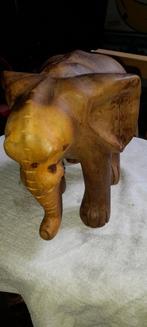 Éléphant en bois d'afrique, Ophalen