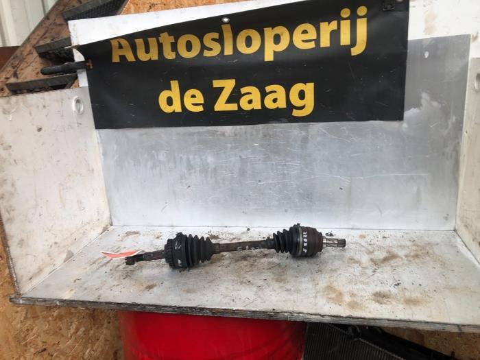 Aandrijfas links-voor van een Opel Corsa, Auto-onderdelen, Remmen en Aandrijving, Opel, Gebruikt, 3 maanden garantie, Ophalen of Verzenden