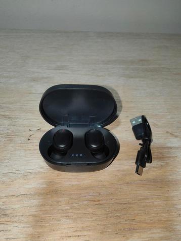 Zwarte bluetooth oortelefoons  beschikbaar voor biedingen