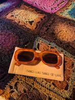 Oranje zonnebril van Tiltil, Comme neuf, Autres marques, Enlèvement ou Envoi, Lunettes de soleil
