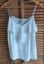 Prachtig topje large H&M., H&M, Enlèvement ou Envoi, Comme neuf, Taille 42/44 (L)