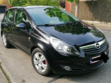 Opel Corsa 1.4i Benzine 2010 EURO 5, Auto's, Euro 5, Stof, Zwart, Zwart