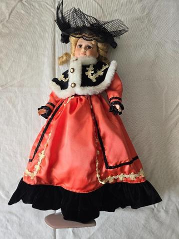 Vintage porseleinen pop op staander beschikbaar voor biedingen