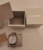 Montre Michael Kors, Enlèvement