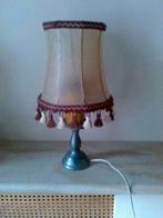 Antieke staanlamp met tinnen voet en kap in varkensblaas.
En, Ophalen