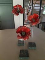 Keramieken klaprozen op voet, Ophalen