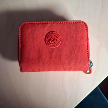 kipling portefeuille oranje beschikbaar voor biedingen