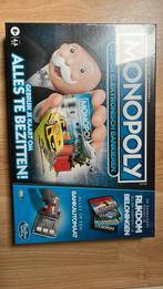 Elektronische monopoly in verpakking, Ophalen