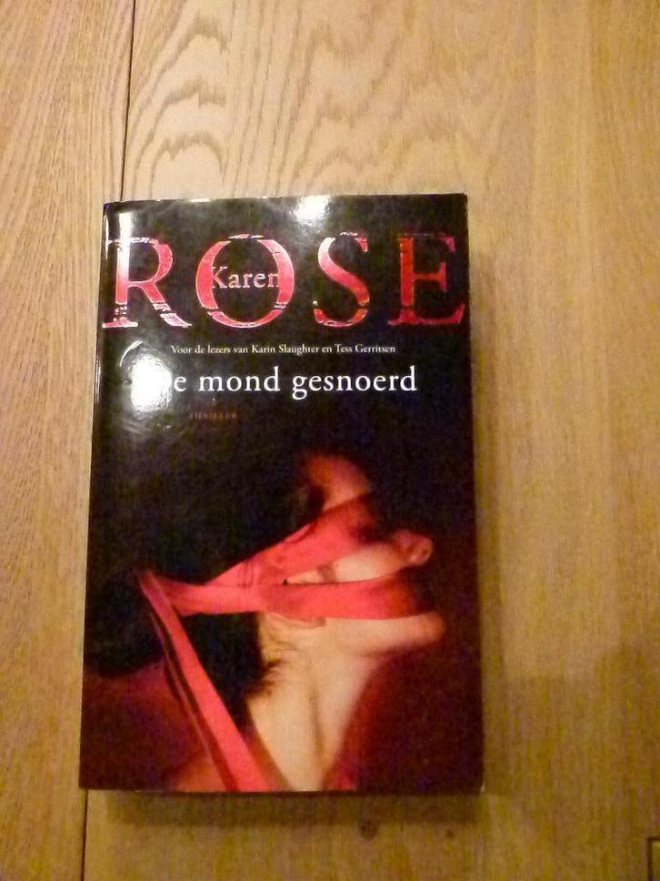 "De mond gesnoerd" Karen Rose, Boeken, Thrillers, Zo goed als nieuw, Ophalen of Verzenden