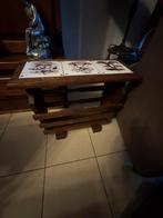 Eikenhouten krantenhouder, Ophalen