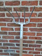 Mesthaak 4 tanden en steel, Ophalen