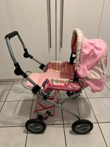 Roze poppenbuggy beschikbaar voor biedingen