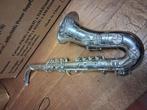 Speelgoed saxofoon., Ophalen