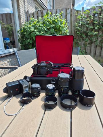[Nieuwstaat] Canon A1 + 35-105mm f3.5 + 70-210mm f4 beschikbaar voor biedingen