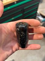 Carbon pookje, Ophalen