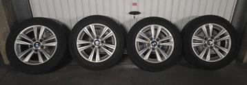 4 velgen met winterbanden gemonteerd voor BMW beschikbaar voor biedingen