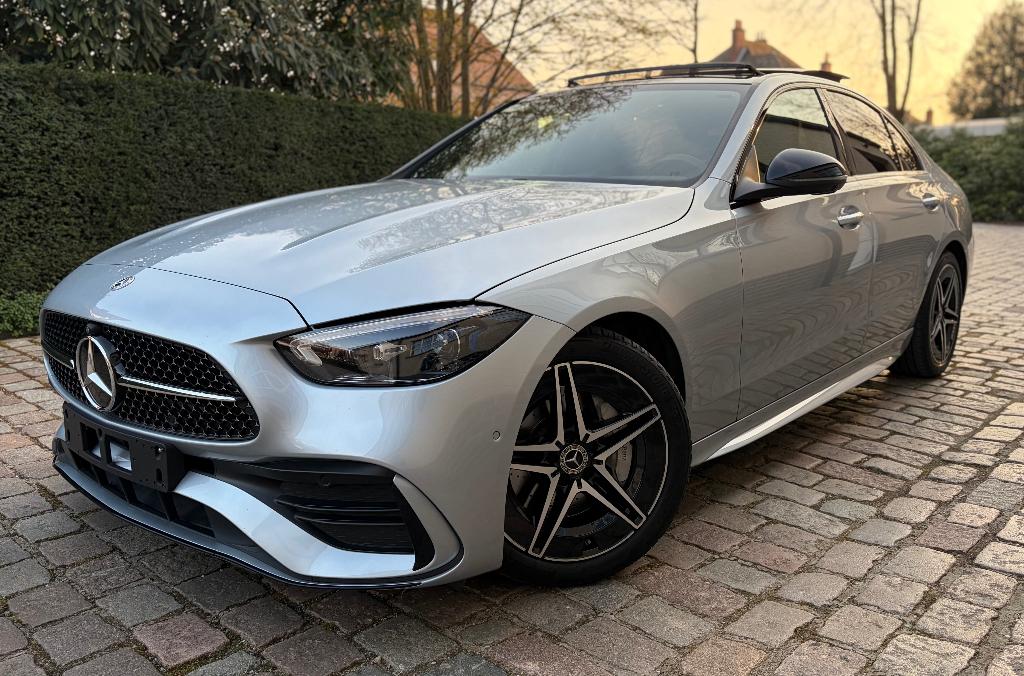 Mercedes-Benz C 180 AMG Line Pano Head up display 32000 km, Autos, Mercedes-Benz, Cuir, Argent ou Gris, Achat, Euro 6