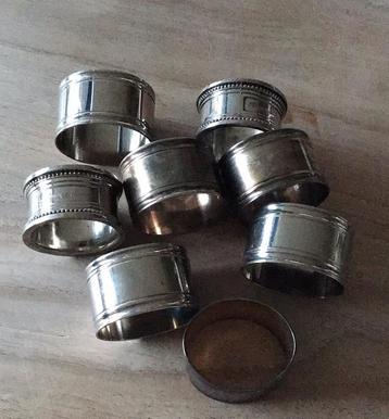 8 zilver kleurige servietringen voor de feestdagen beschikbaar voor biedingen