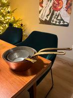 Antieke koperen pannenset