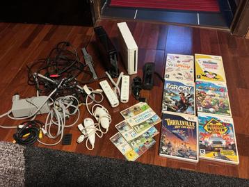 Nintendo Wii set van 2 met verschillende games en accessoire beschikbaar voor biedingen