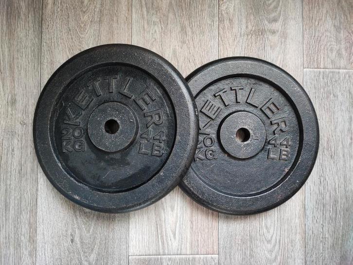 2 x 20kg Kettler halterschijven. (40kg) (Goede staat!), Sport en Fitness, Fitnessmaterialen, Gebruikt, Halterschijven, Armen, Benen