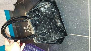 Prachtig blinkende tas beschikbaar voor biedingen