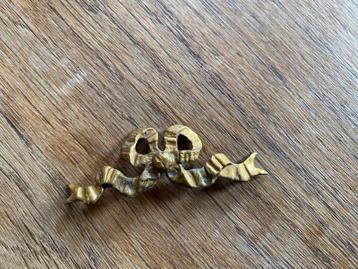 Goudkleurige stalen strik, antiek 6cm x 2cm voor frame beschikbaar voor biedingen