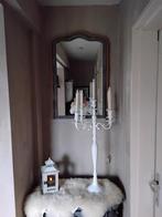 Halkast en spiegel, Ophalen