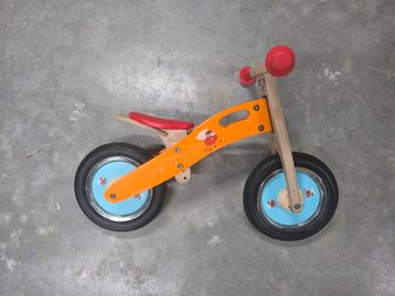 Houten loopfietsje  beschikbaar voor biedingen