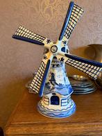 Stenen molen beeldje, Ophalen