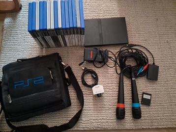PS2 slim in vintage PS2bag+toebehoren+games zie beschrijving beschikbaar voor biedingen