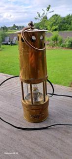 Mijnwerkerslamp, Ophalen