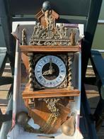 vintage klok met bronzen elementen, Enlèvement