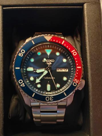 Montre automatique SEIKO SPORT 5 PEPSI pour homme disponible aux enchères