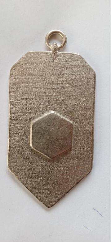 Hanger in zamac beschikbaar voor biedingen