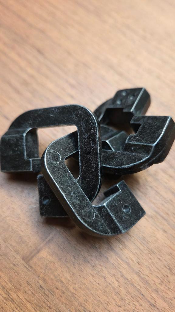 Breinbreker Metalen puzzel met schakels, Hobby en Vrije tijd, Denksport en Puzzels, Gebruikt, Rubik's of 3D-puzzel, Minder dan 500 stukjes