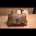 Sac tout en cuir., Enlèvement