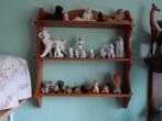 Une petite Archelle avec une collection de chiens, Ophalen