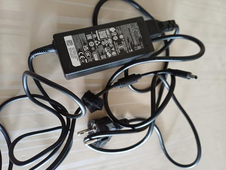 Dell HA65NS5-00., Computers en Software, Laptop-opladers, Zo goed als nieuw, Ophalen of Verzenden