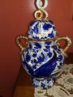 Blauwe vaas, Ophalen