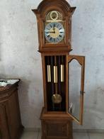 Staande klok, Ophalen