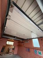 Garagepoort met motor sectionale poort