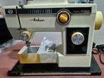 Naaimachine Anker, Ophalen