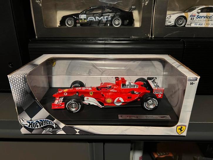 Ferrari F2004 – Michael Schumacher (2004), 1:18 Hot Wheels, Hobby en Vrije tijd, Modelauto's | 1:18, Nieuw, Auto, Hot Wheels, Ophalen