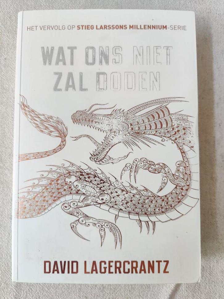David Lagercrantz - Wat ons niet zal doden, Boeken, Thrillers, Zo goed als nieuw, Ophalen of Verzenden
