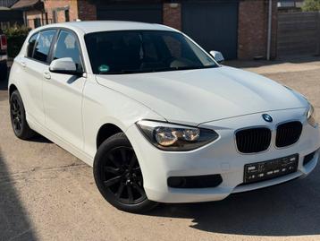 BMW 1 SERIE ✅ 1 REEKS 116i Alpineweiss GARANTIE AIRCO Navi beschikbaar voor biedingen