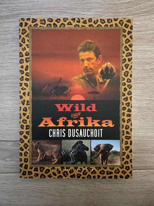 Chris Dusauchoit - wild van Afrika, Boeken, Natuur, Zo goed als nieuw, Ophalen of Verzenden